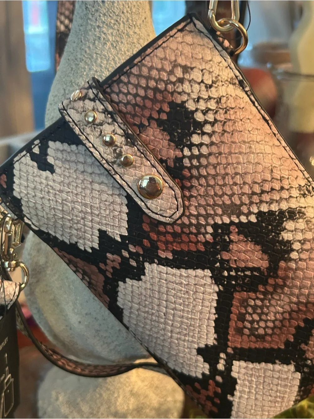 Women’s Snake-Print Crossbody Wristlet in Pink and Black